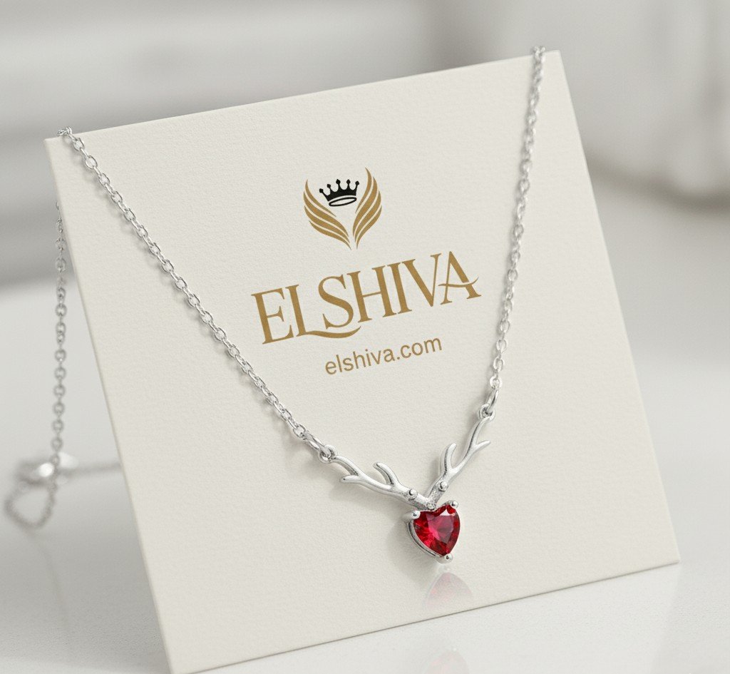 Elegant Silver Antler Necklace with Red Heart Crystal